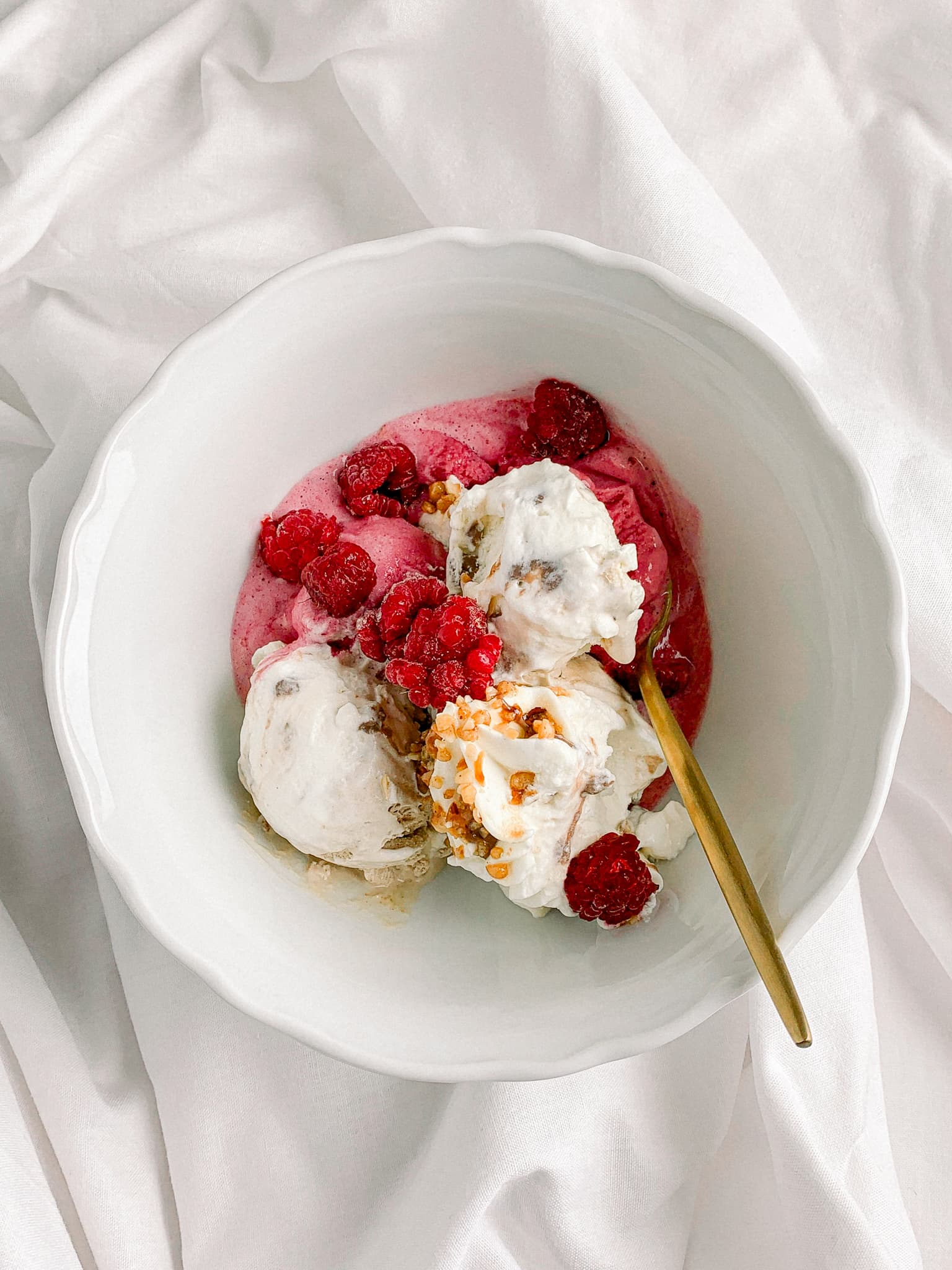 Scoops of ice cream in a bowl or cone, soft light, inviting dessert moment